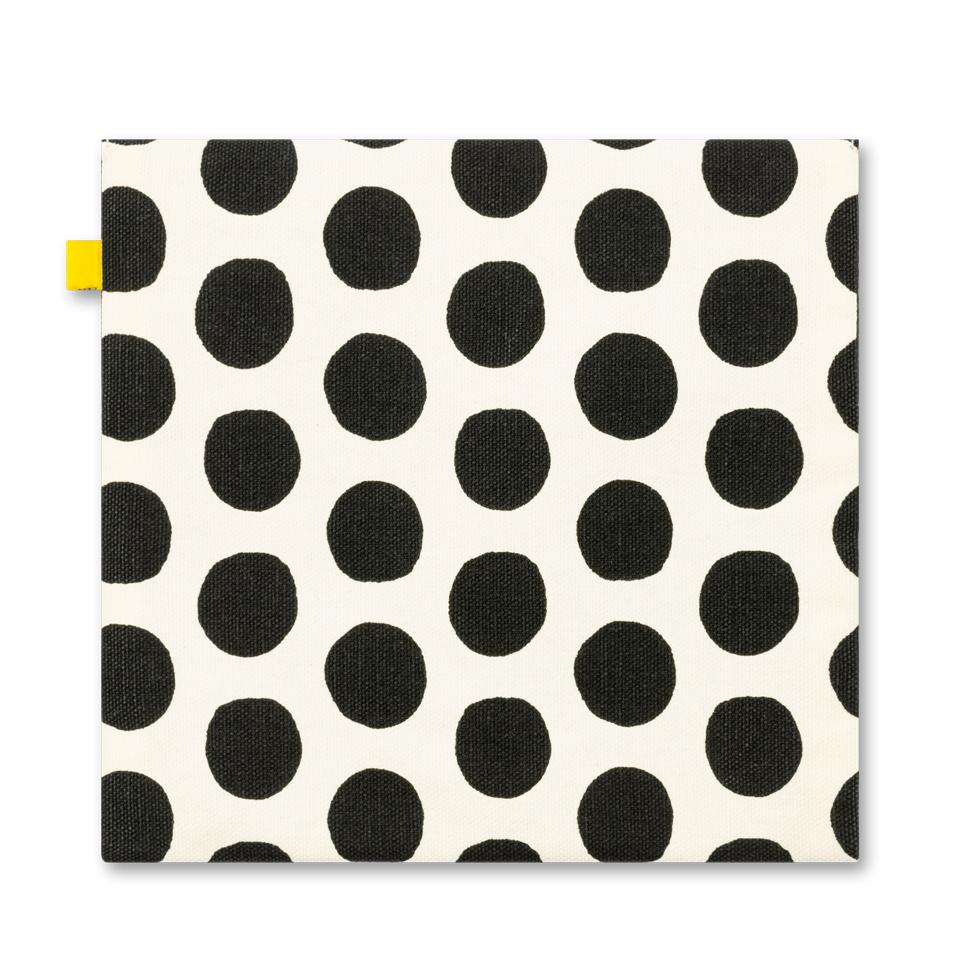 The back of Reusable and machine washable snack bag in a sandwich size, with black and white dots design