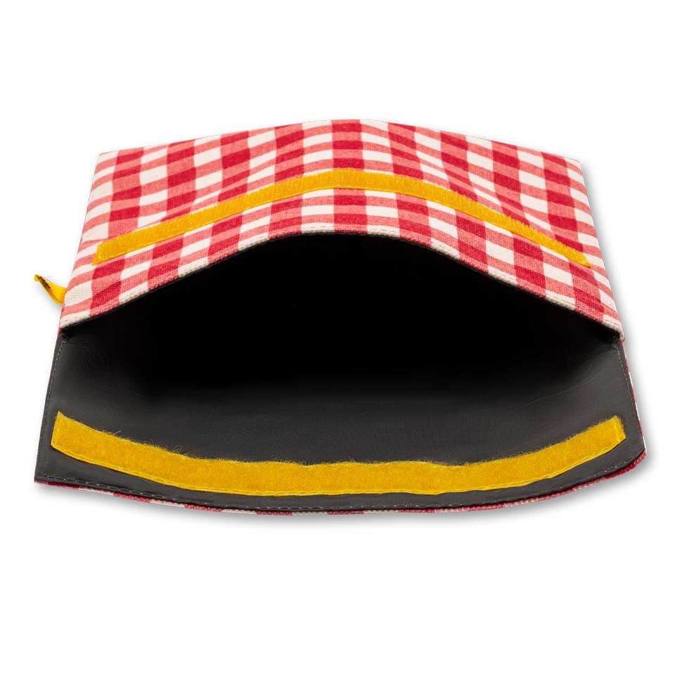 Open Reusable and machine washable snack bag in a sandwich size, with gingham design design and yellow velcro.