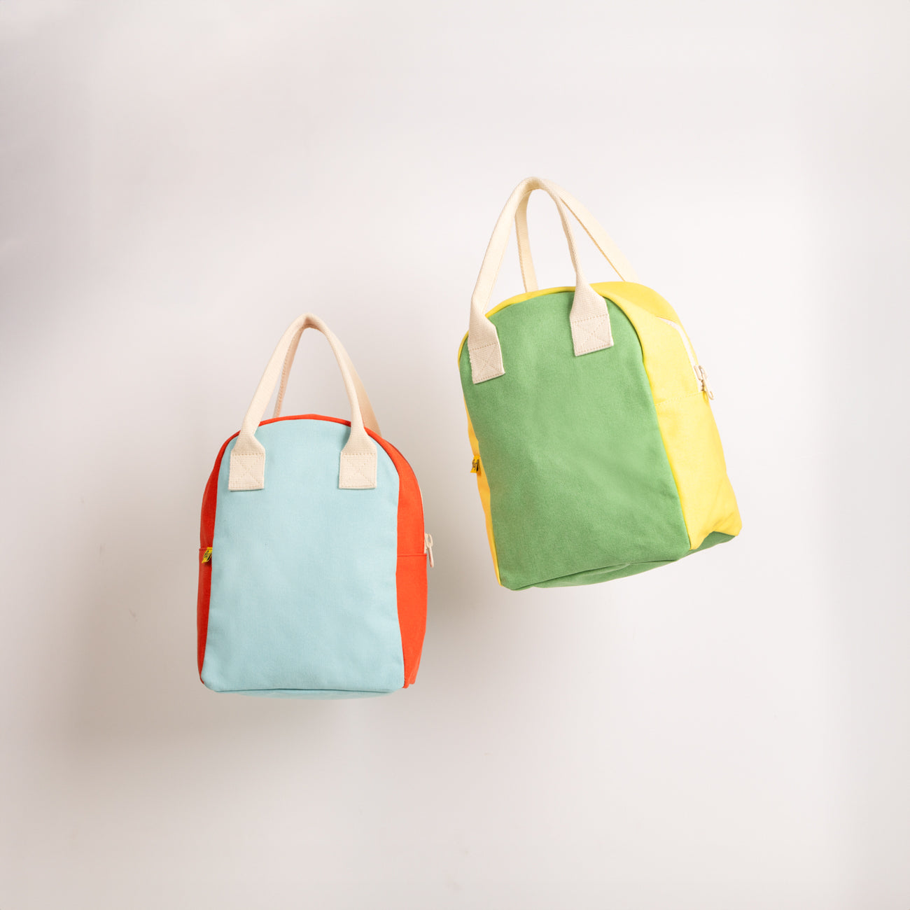 Zipper Lunch bags by Fluf available in  Tennis ball color and pop ice colors 